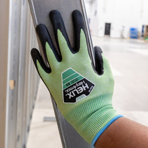 worker wearing the helix 1053 with hand on beam