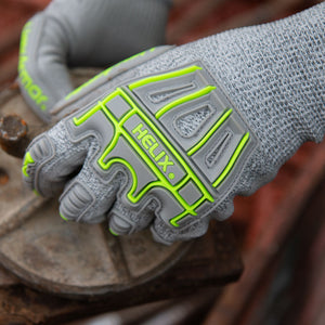 worker taking bolts off part wearing Helix® 1074IMP