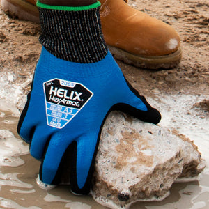worker hand in water grabbing a piece of concrete wearing Helix® 2065