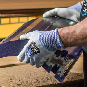 worker holding metal part wearing Helix® 2085