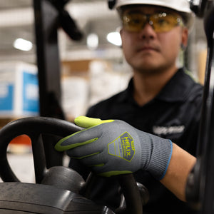 worker driving a hi lo wearing Helix® 3014