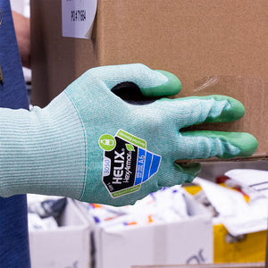 warehouse working holding a box wearing Helix® 3050