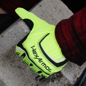 worker wearing Chrome Series® 4033 holding a cinder block