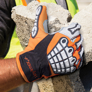 person wearing Chrome SLT® Oasis 4073 holding a broken concrete block