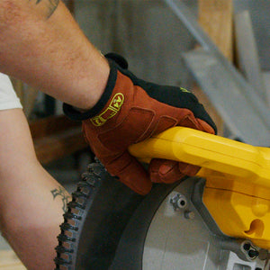 worker wearing HeatArmor® 5059 using tool