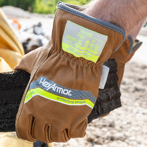 Hands wearing chrome slt 5072 water and oil resistant gloves with sustainable leather treatment.