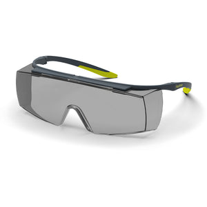 Grey and yellow LT250 OTG grey safety glasses shown as they are sitting on a table.