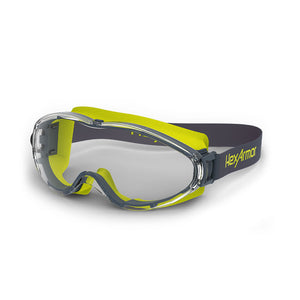 Grey and yellow LT300 anti-fog safety goggles shown as they are sitting on a table.