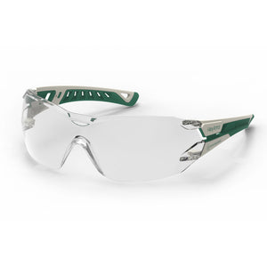 White and green MX225 planet series sustainable anti-fog safety glasses shown as they are sitting on a table.