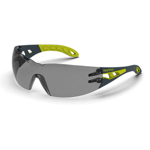 Grey and yellow MX200 grey 23 anti-fog safety glasses shown as they are sitting on a table.
