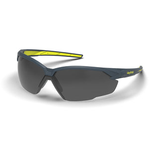 Grey 12% NX1 anti-fog safety glasses shown as they are sitting on a table.
