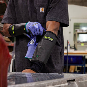 Worker putting on the AG8TW needle resistant arm
