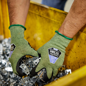 worker grabbing two handful of metal brackets wearing Helix® 2080