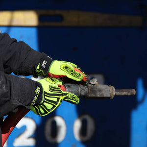 worker holding a hose wearing Rig Lizard® 2021