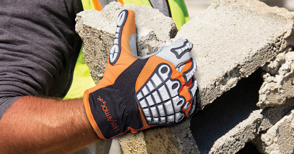 Man moving concrete wearing Chrome SLT Oasis 4073 safety gloves.