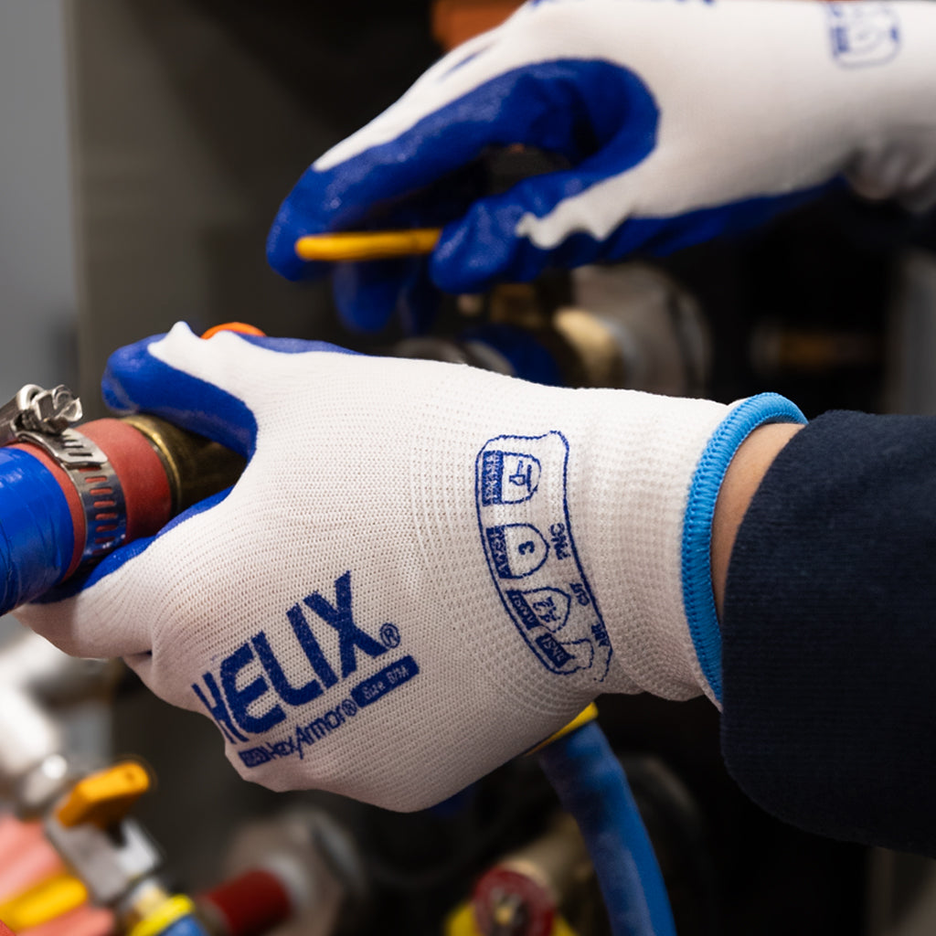 worker fixing a hose wearing Helix® 1040