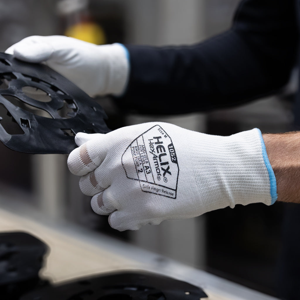 worker inspecting a part wearing Helix® 1052