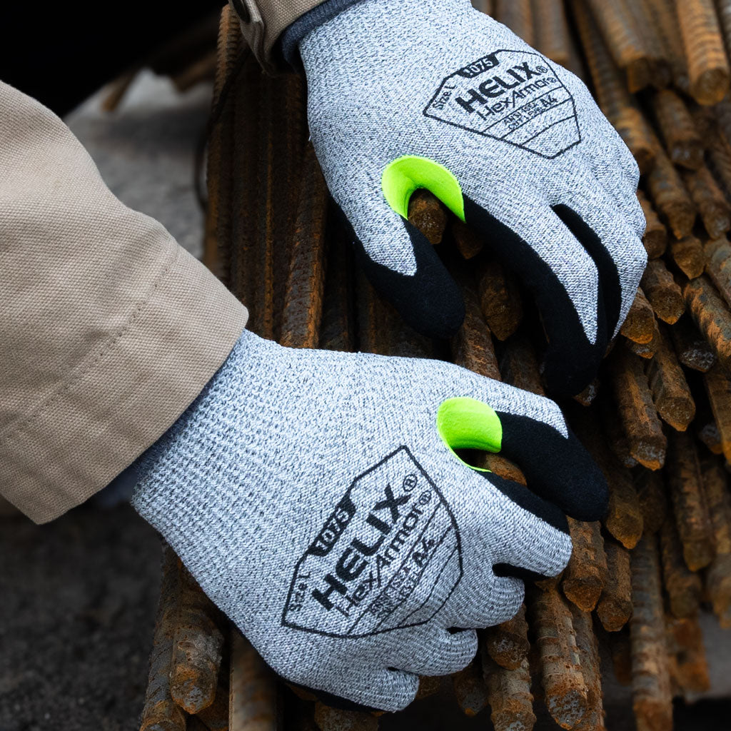 worker holding rebar wearing Helix® 1075