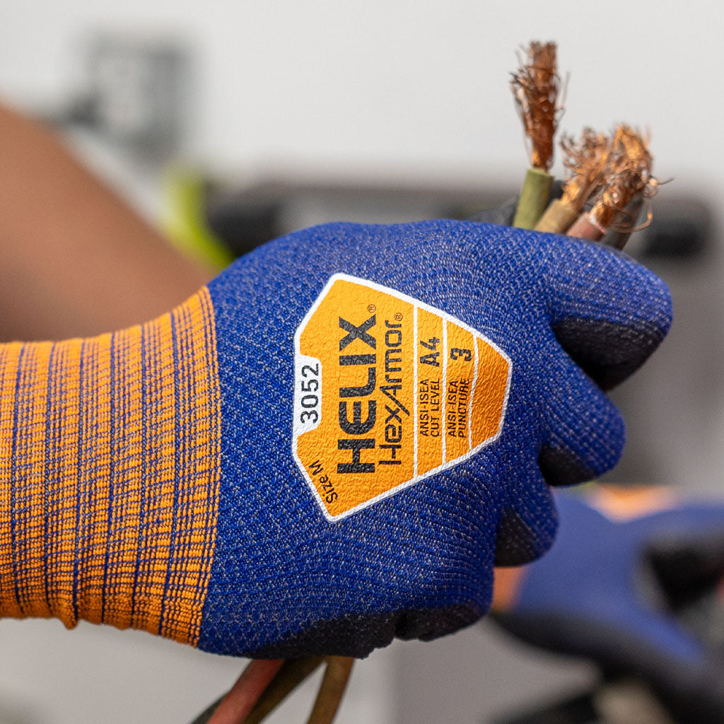 person holding wire wearing Helix® 3052