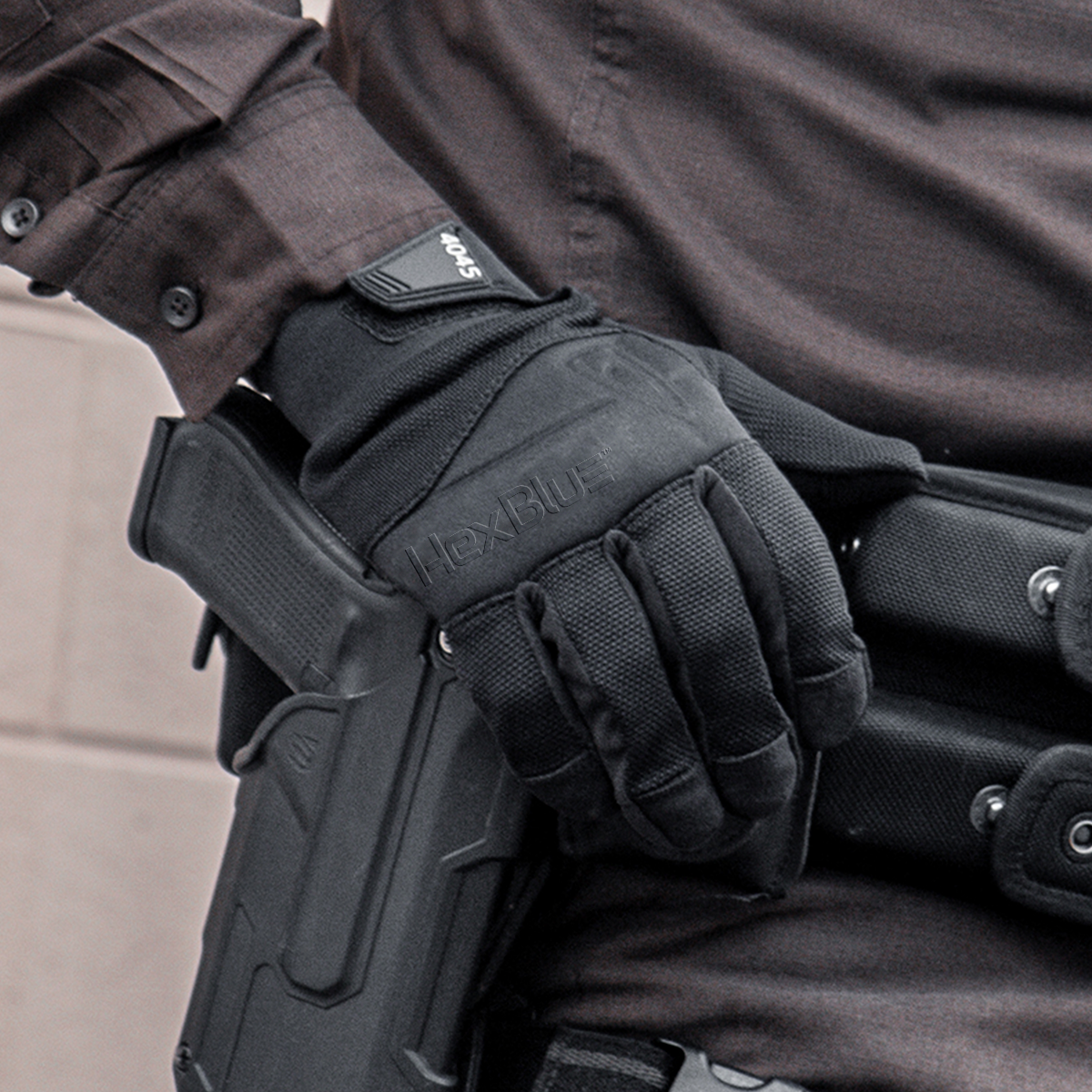Law enforcement officer hand wearing HexBlue™ 4045.