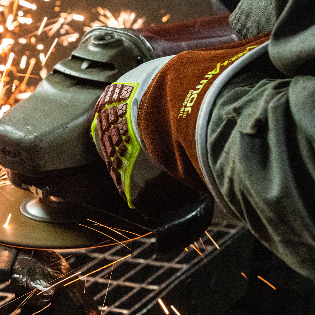 worker using a grinder wearing HeatArmor® 5055
