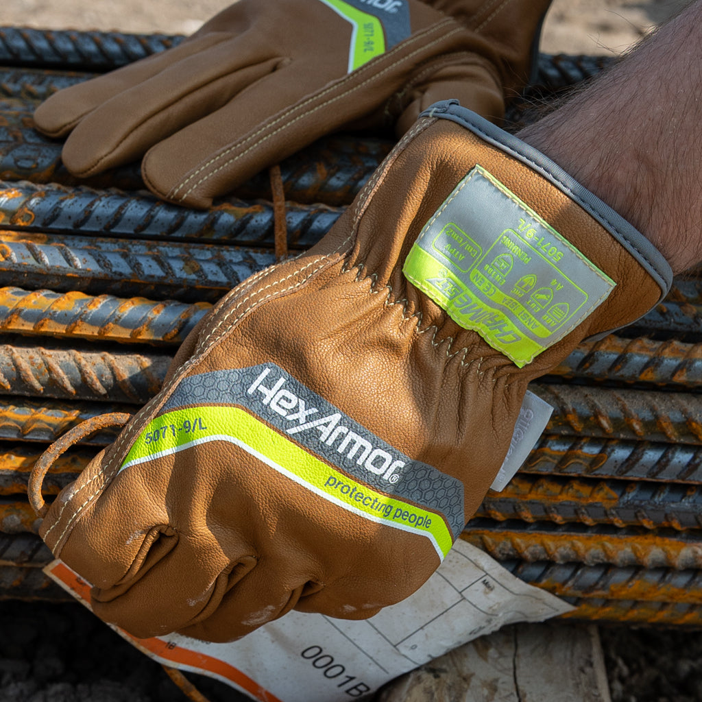 Hands wearing chrome slt 5071 water and oil resistant gloves with sustainable leather treatment.