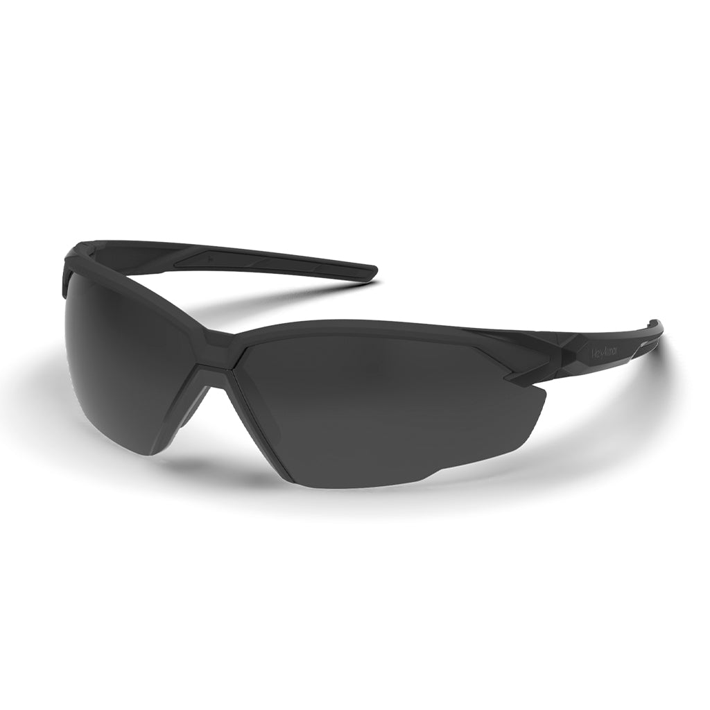 Black X1 weld shade glasses shown as they are sitting on a table.